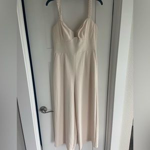 Off white Astr jumpsuit new with tags. Perfect for a rehearsal dinner or shower